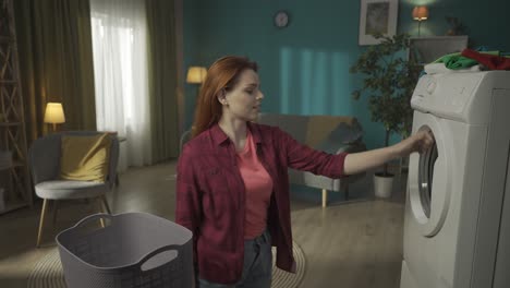 woman doing laundry, frustrated with washing machine