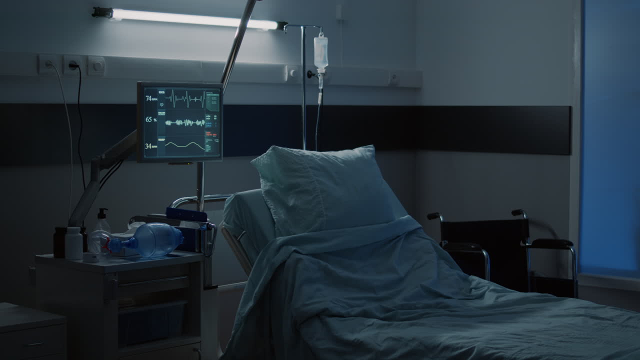 Modern hospital ward with comfortable empty bed