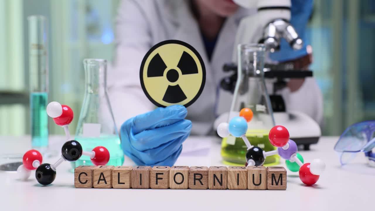 Scientist with Californium and Radiation Symbol in Laboratory
