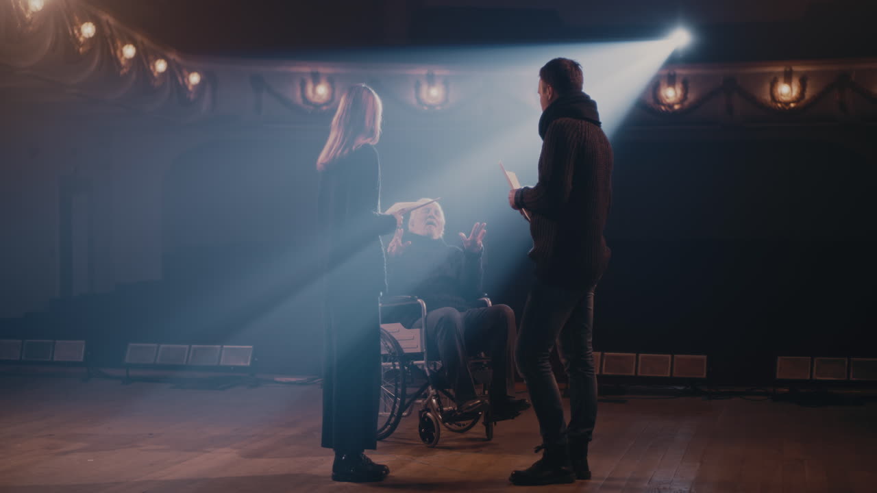 Senior Actor Rehearsing Scene with Colleagues during Drama Class Senior Caucasian Actor Rehearsing Scene with Mature Female Colleague during Drama Class