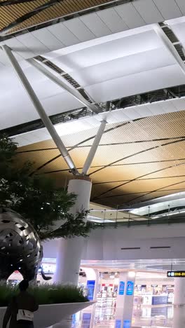 time-lapse of dinosaur exhibit in a bustling airport terminal.