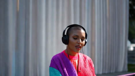 woman listening to music outdoors