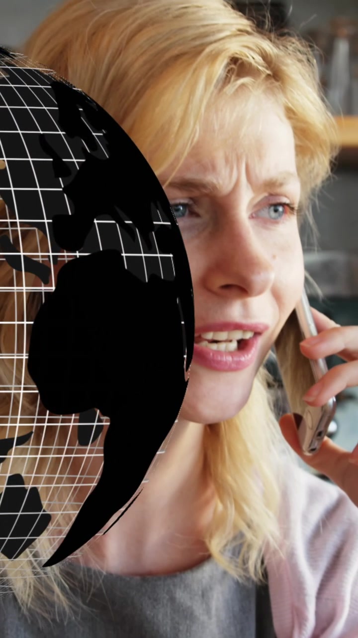 Animation of globe spinning over woman using smartphone