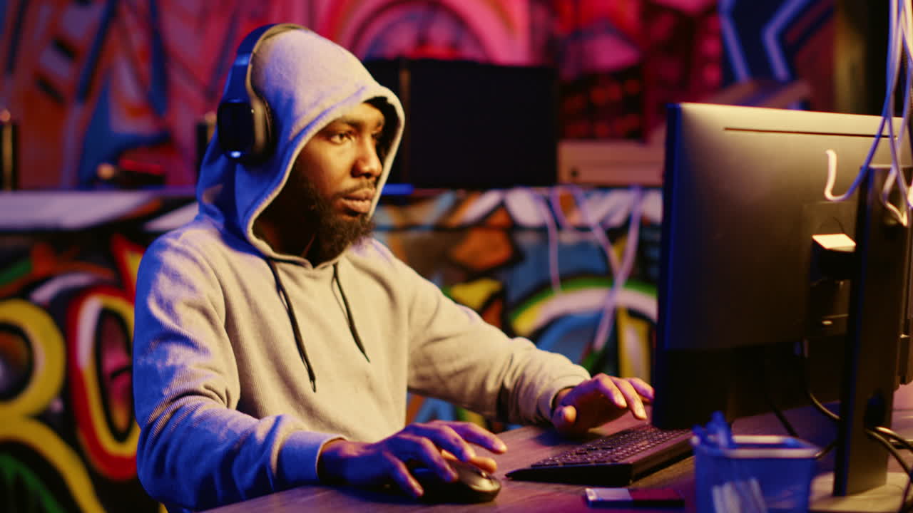 Hacker listening music while hacking