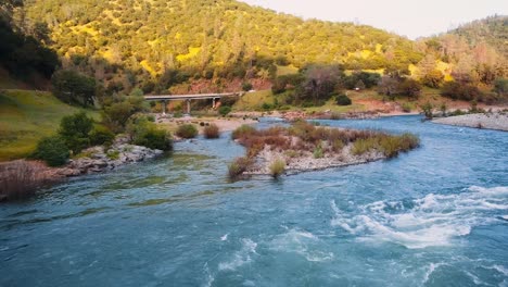 Drone-flying-over-river-in-Northern-California