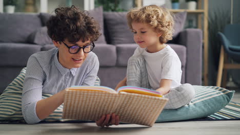 mother and son reading together