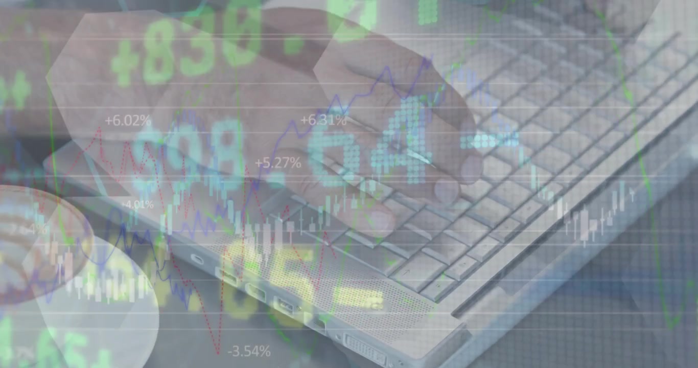 Person Typing on Laptop with Financial Data Overlay