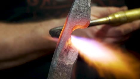 blacksmith metal forging in 120fps slow motion