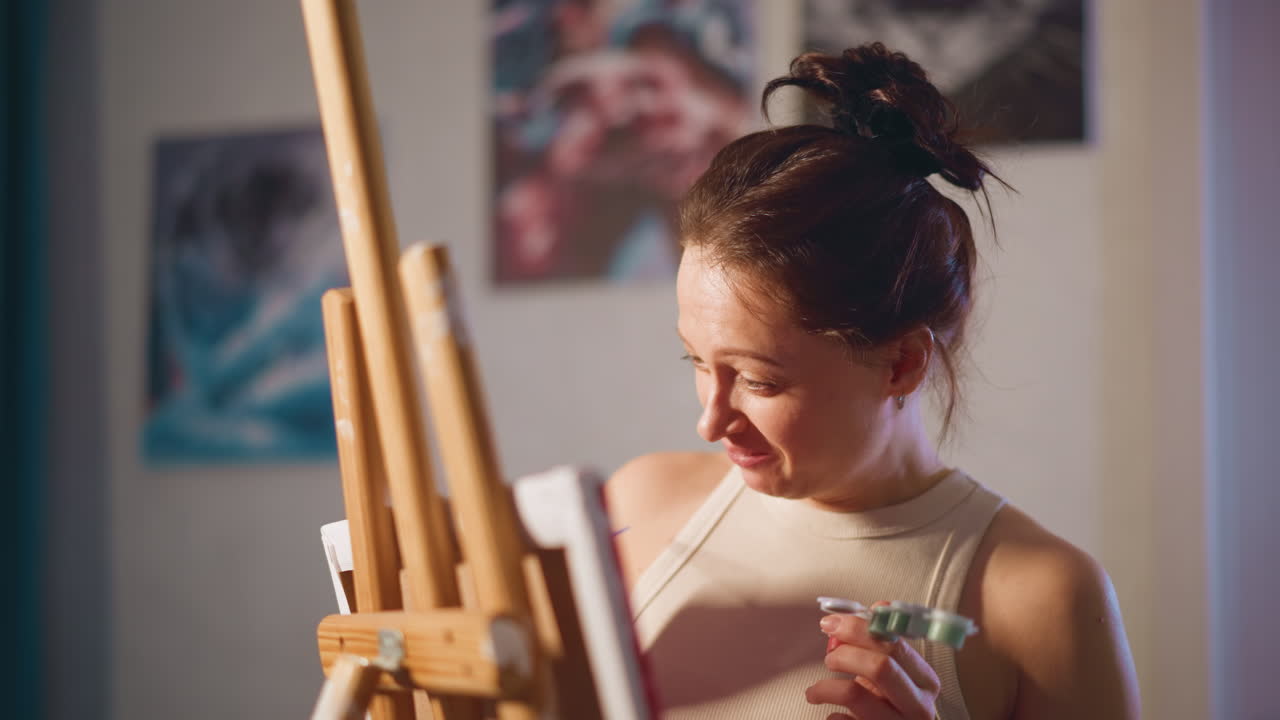 Reflective Artist Working On Floral Creation, Caucasian Artist Carefully Engaged In Floral Painting Process, Painter With Reflective Gaze Deliberately Developing MultiLayered Floral Artwork
