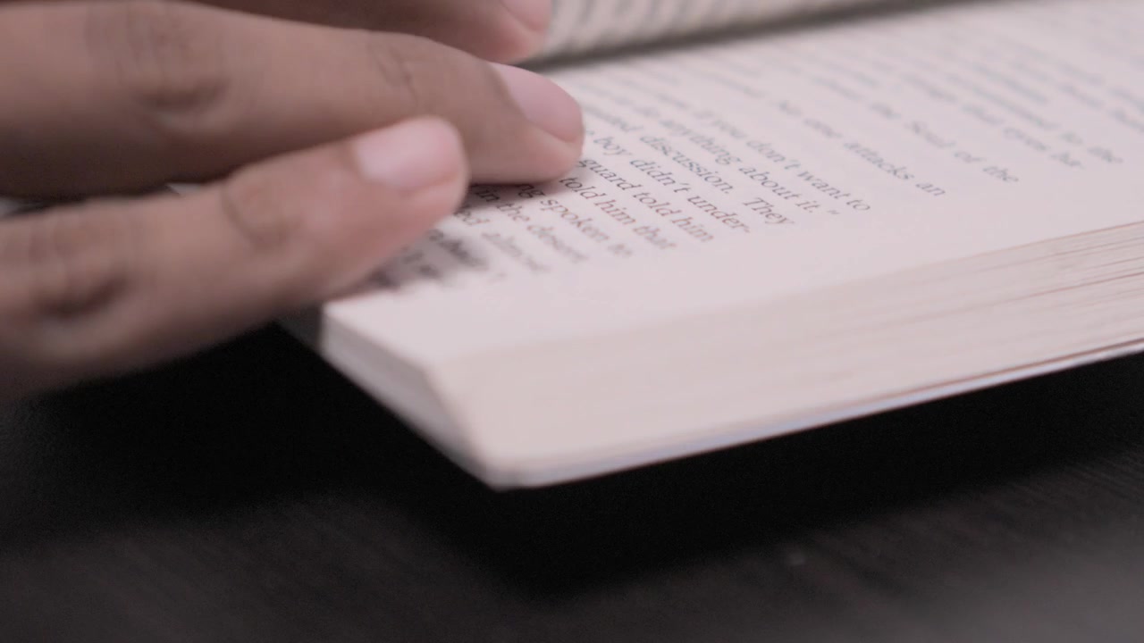 Flipping the Pages of a Novel.