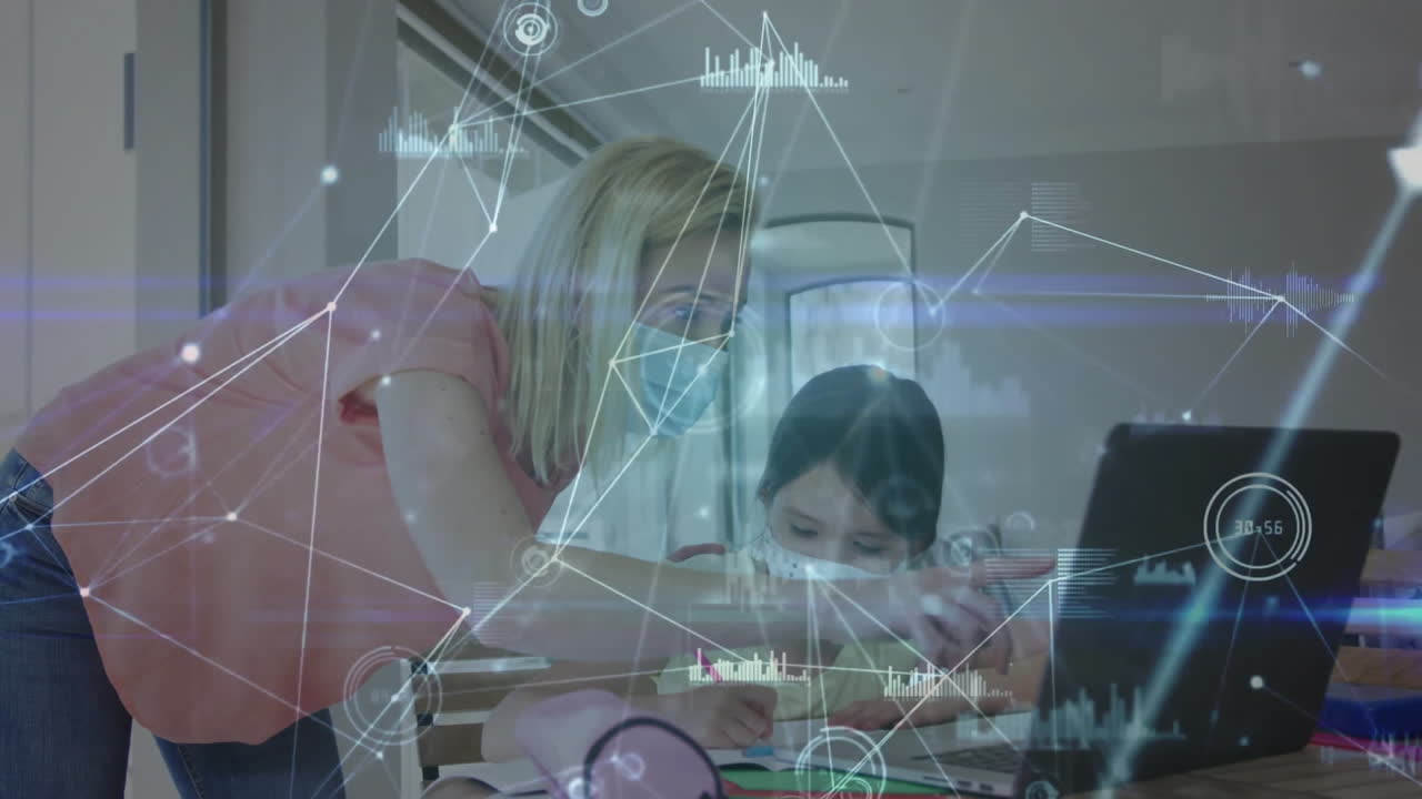 mid adult woman leaning over girl at table for education, presenting laptop and network graphics