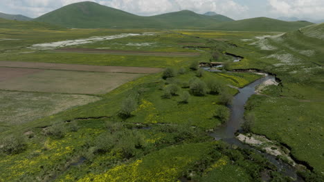 wetlands and green meadow fields in ktsia-tabatskuri managed reserve in samtskhe-javakheti region of georgia