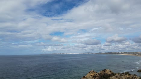 coastal landscape with ocean and blue sky