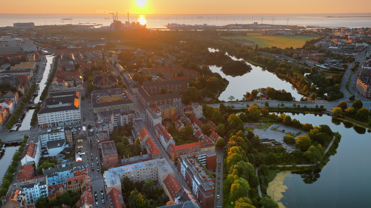 Aerial drone view of the city centre of Copenhagen, Denmark at sunset