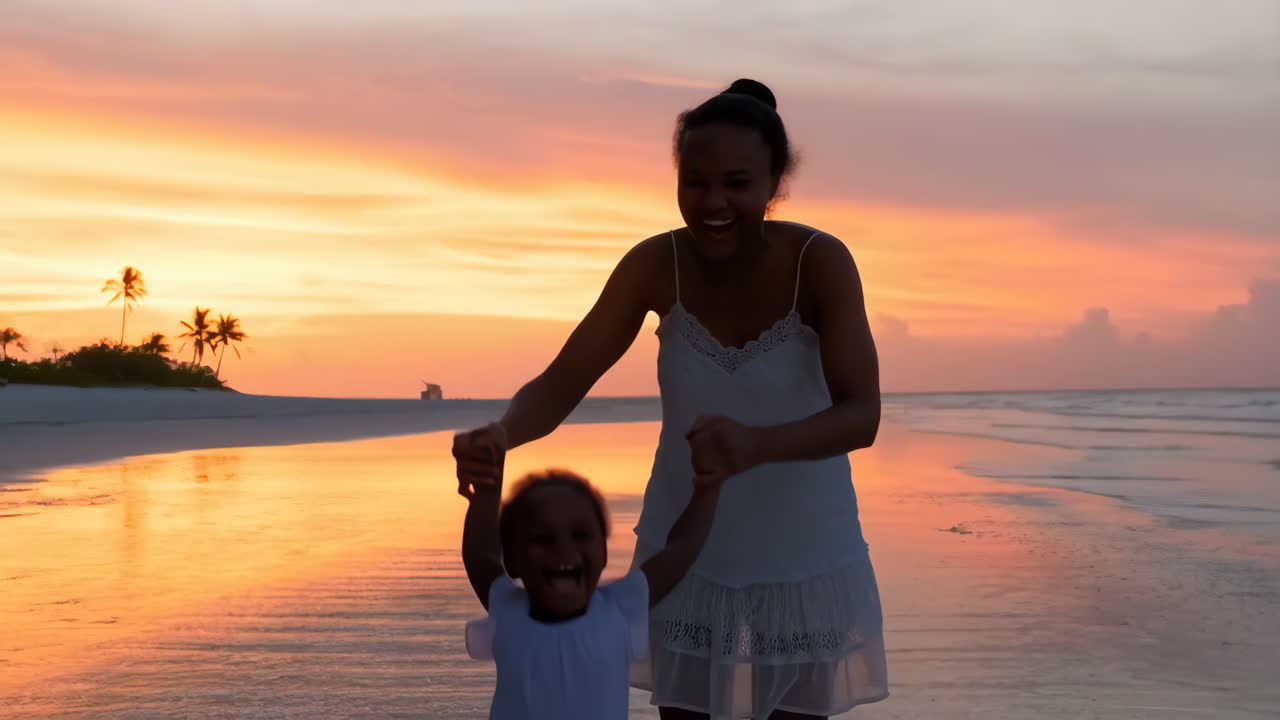 Mother and Child Playing on a Tropical Beach at Sunset