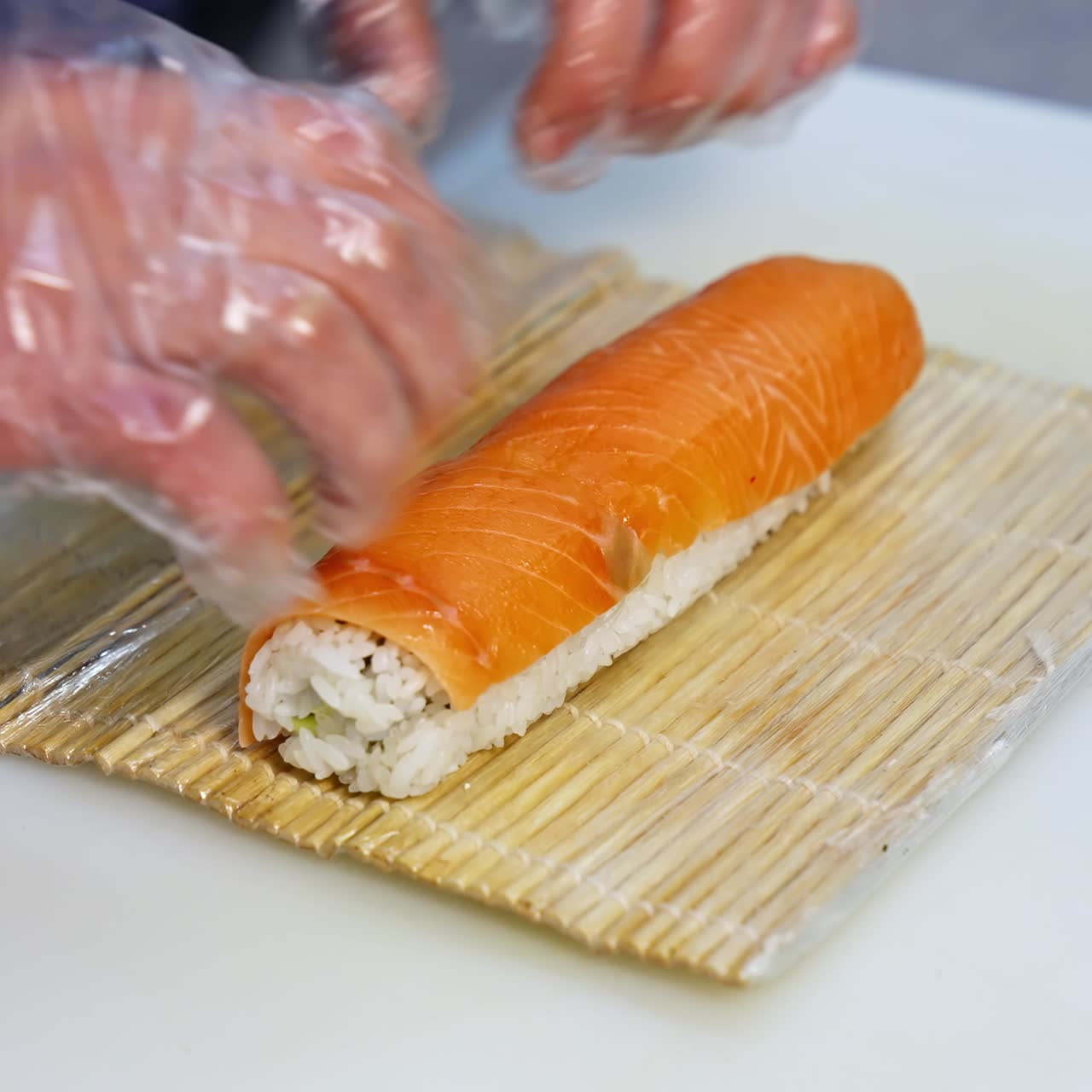 Chef hands preparing japanese food