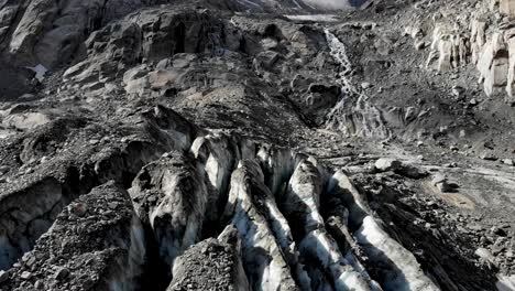 aerial flyover over the crevasses of the tiefen glacier in uri, switzerland