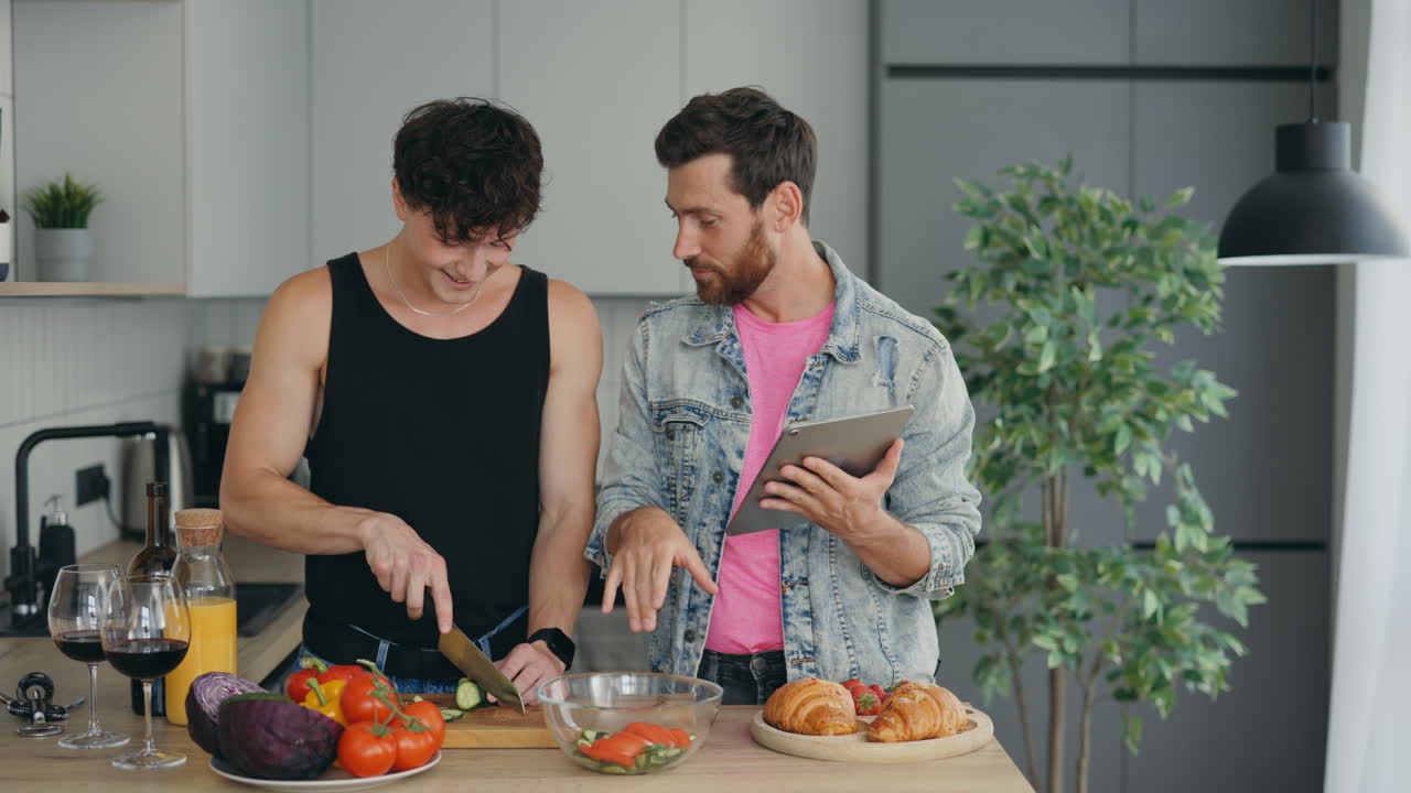 Two Men Cooking Together in a Modern Kitchen