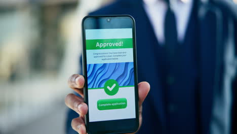 loan application approval on smartphone