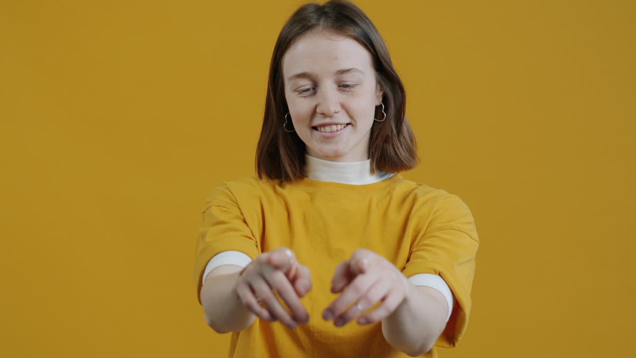 Smiling Woman in Yellow Shirt