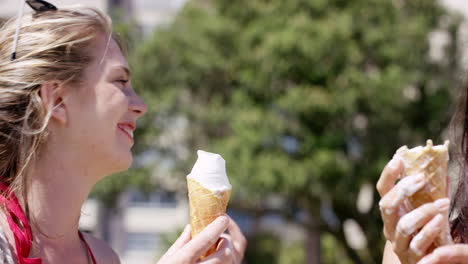 Close-up-portrait-teenage-girls-eating-ice-cream-in-the-summer-on-vacation