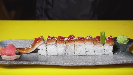 chef preparing unagi sushi