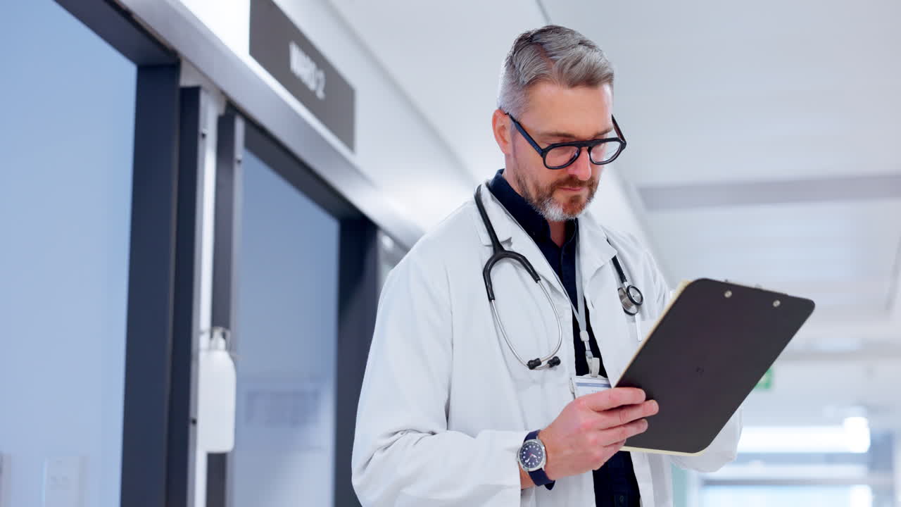 Doctor, man and hospital charts