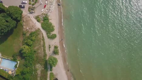 Aerial-shot-of-the-beach-with-Canadian-flag