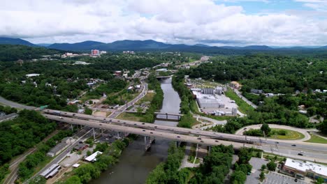 Aerial-Asheville-NC,-Asheville-North-Carolina-flying-down-French-Broad-River