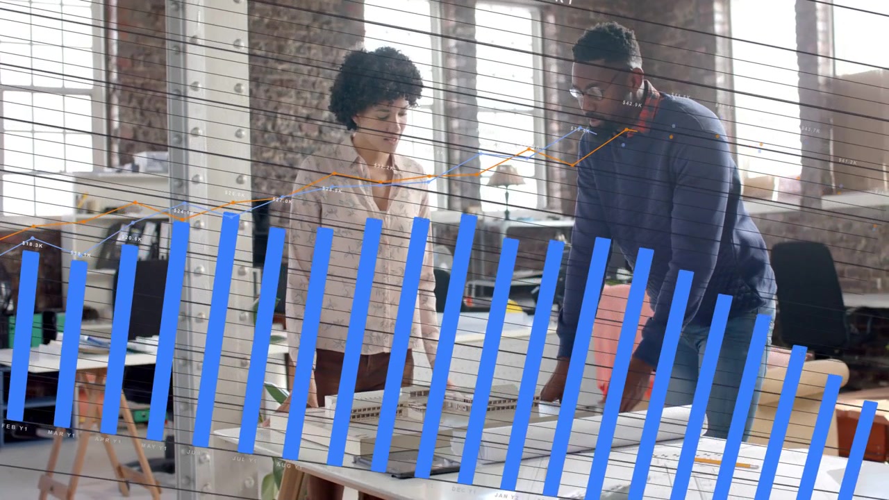 Vertical video: Designers watching man pointing at scale model, blue bars forming visualizing data