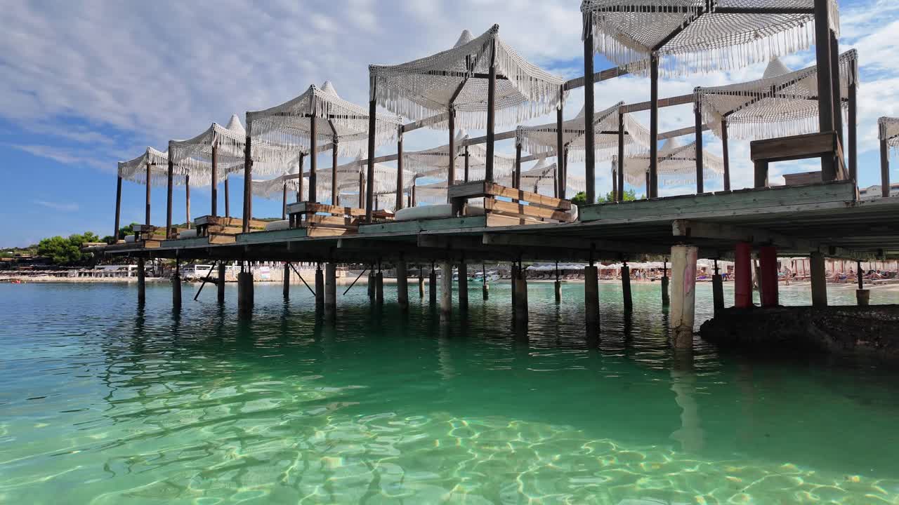 Ksamil Albania empty beach early morning holiday resort village summer