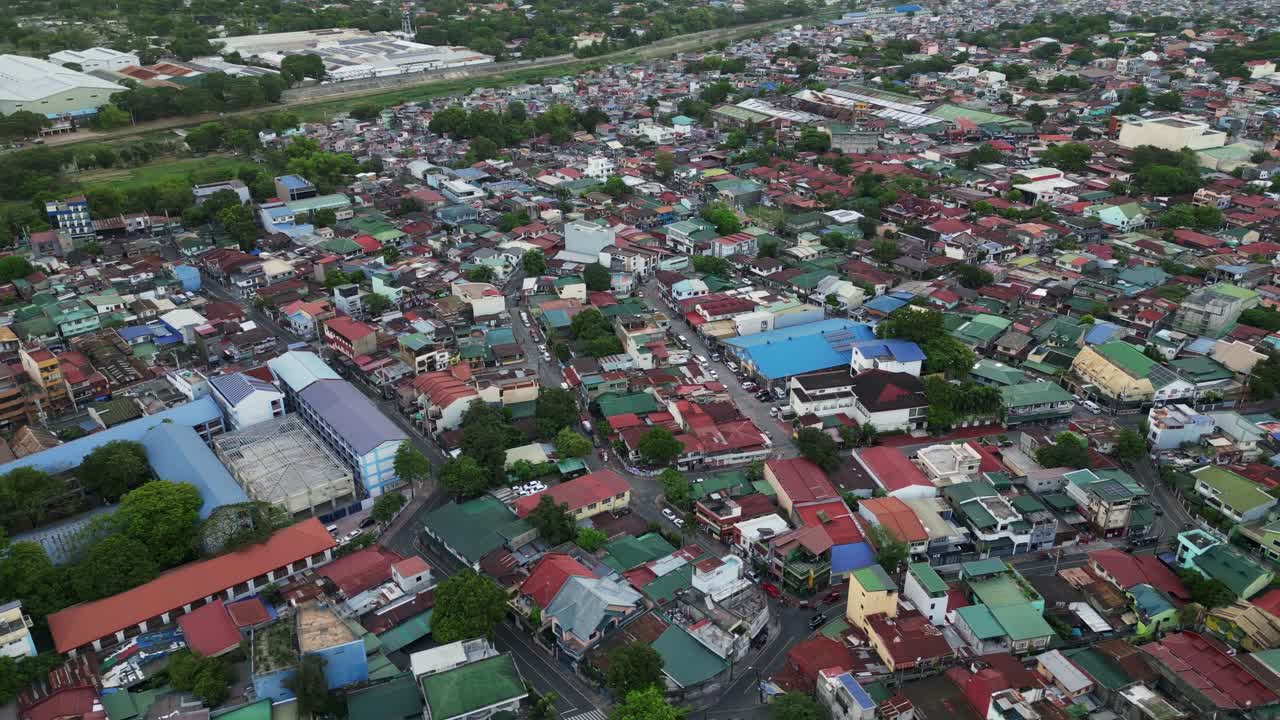 Marikina City overhead view showing dense housing, narrow roads, and trees spread throughout, dense Philippine city textured backdrop