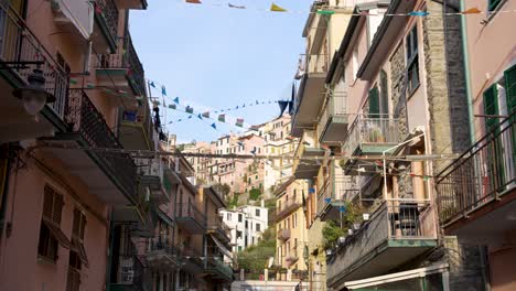 Scenic view of Cinque Terre street, colorful houses, sunny day