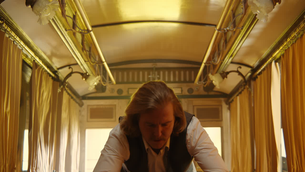 Man Dancing in a Vintage Train Carriage