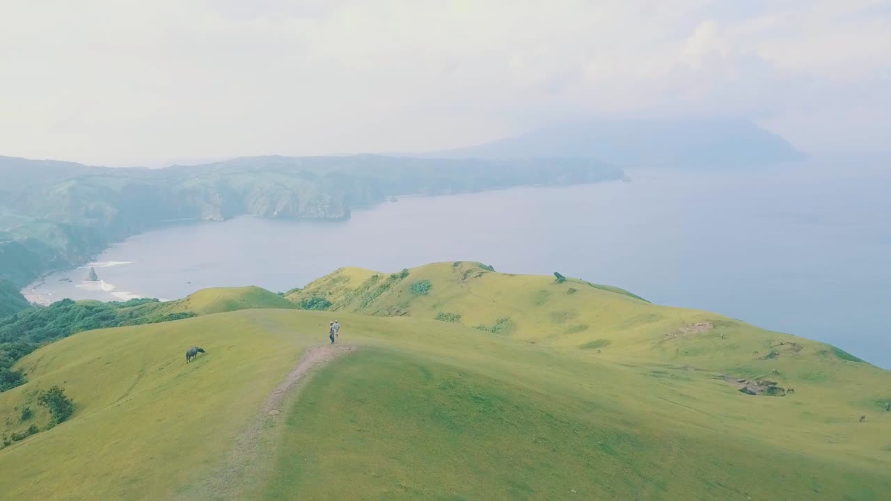 Breathtaking and cinematic aerial drone video of 'marlboro country' like place in Batanes, Philippines.