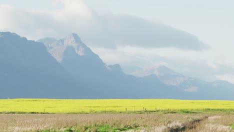 general view of countryside landscape with fields and mountains