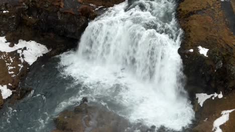 A-4K-drone,-aerial-and-unique-and-cinematic-shots-of-melted-water-flowing-from-a-glacier