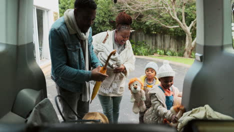 Car,-black-family-and-bag-packing-for-road-trip