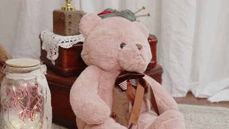 Pink-teddy-bear-with-festive-candy-canes