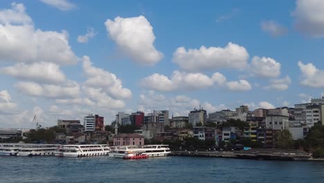 beautiful cityscape with boats and a bridge