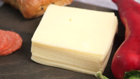 cheese, pepper, and sausage ingredients for cooking