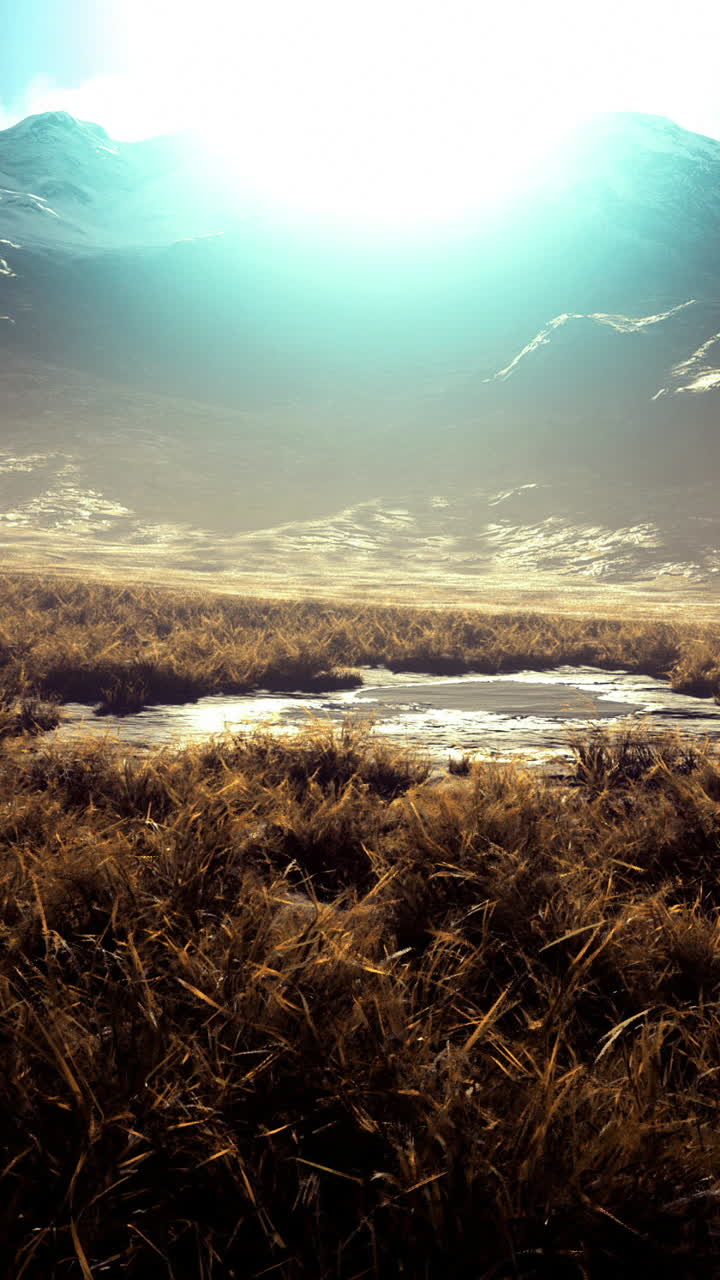 Captivating mountain landscape bathed in golden sunlight during sunrise