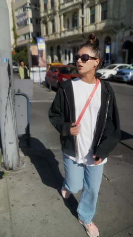 stylish woman walking on a city street