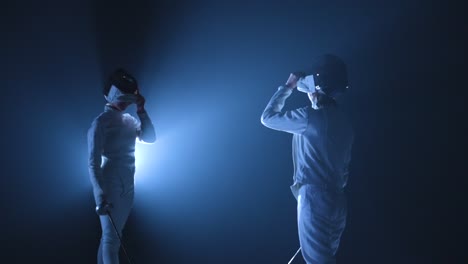 two female fencers in action