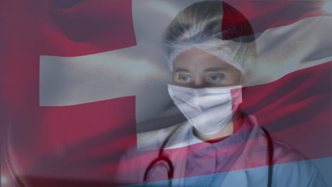 swiss flag waving against female doctor wearing face mask