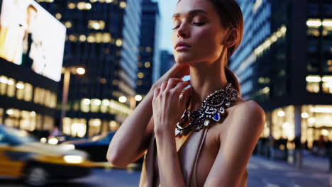 elegant woman in cityscape at night