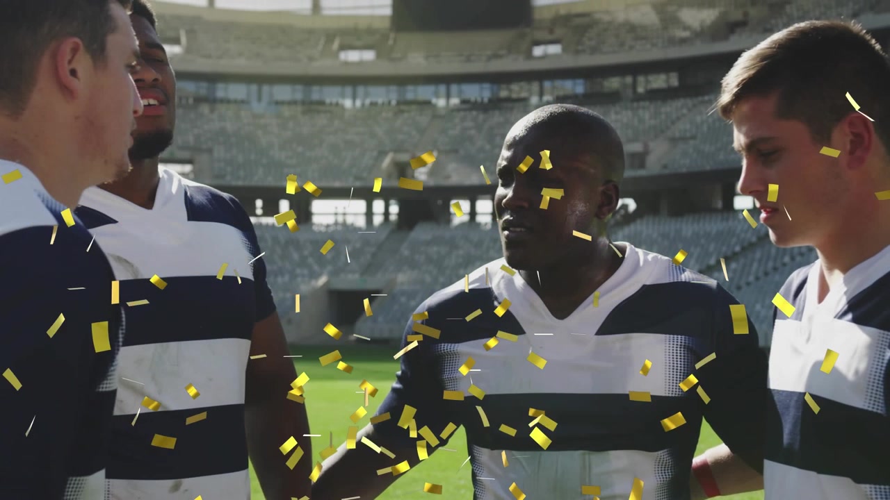 Animation af konfetti, der falder over forskellige mandlige rugbyspillere, der klapper hænder