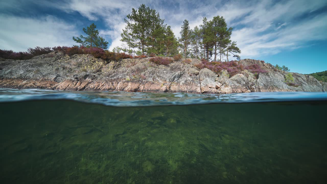 A small rocky island on the Otra river, Norway