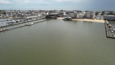 long-rising-drone-bay-to-ocean-Dewey-Beach-Delaware-sunny-summer-day