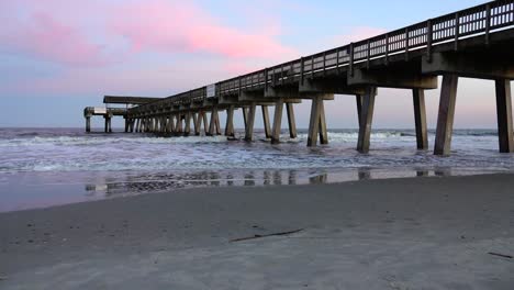 sunset at tybee beach pier with vibrant colors